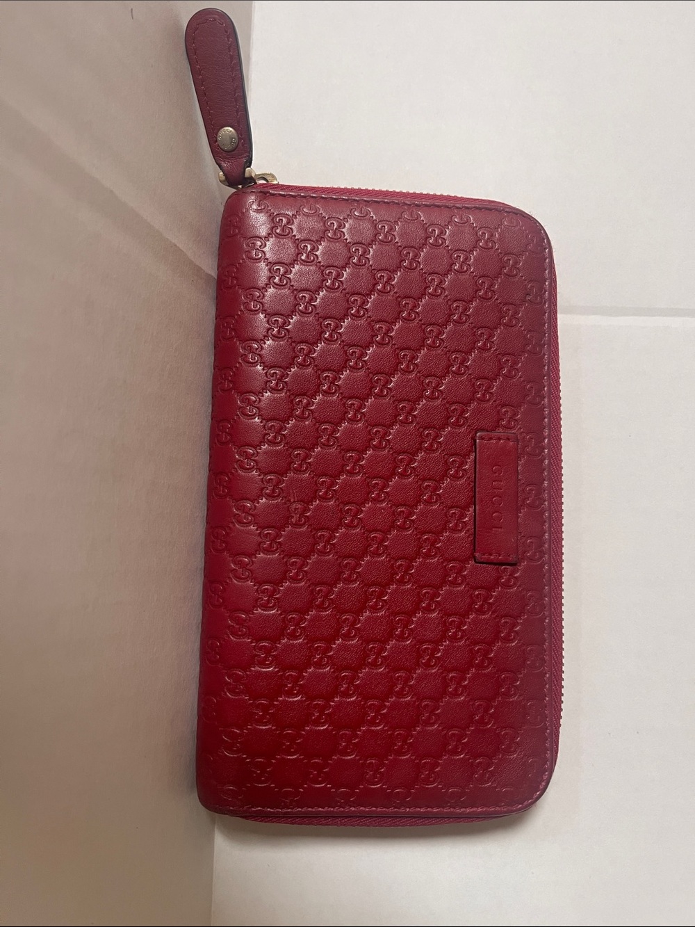 Gucci Embossed Leather Zip-Around Wallet in Burgundy Red